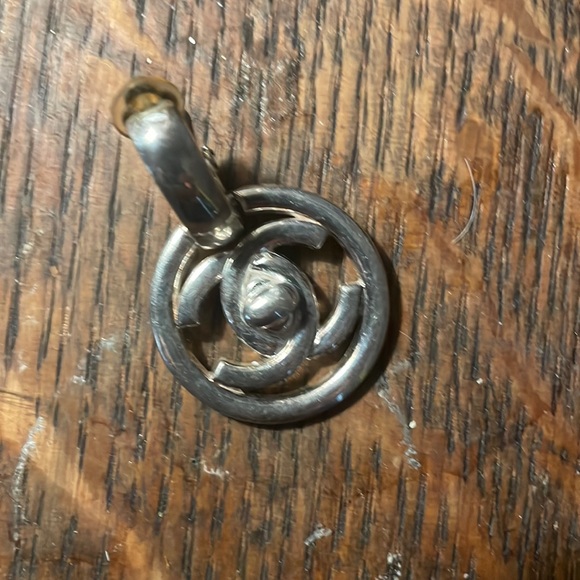 Authentic Chanel Stamped Silver Turn key Clip on Earring - Picture 1 of 2